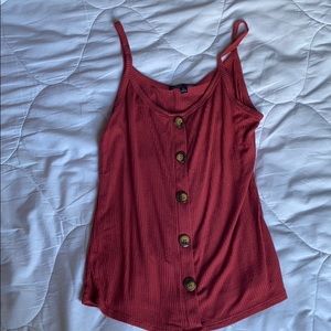 A dark pink tank top